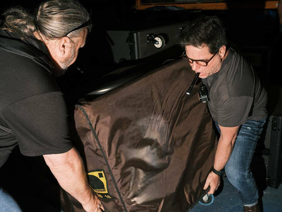 Marcus Ross and Chris &lsquo;Sully&rsquo; Sullivan of L-Acoustics inspect counterfeit L-Acoustics product in the warehouse of Se7ven Sounds Music, Inc before confiscation